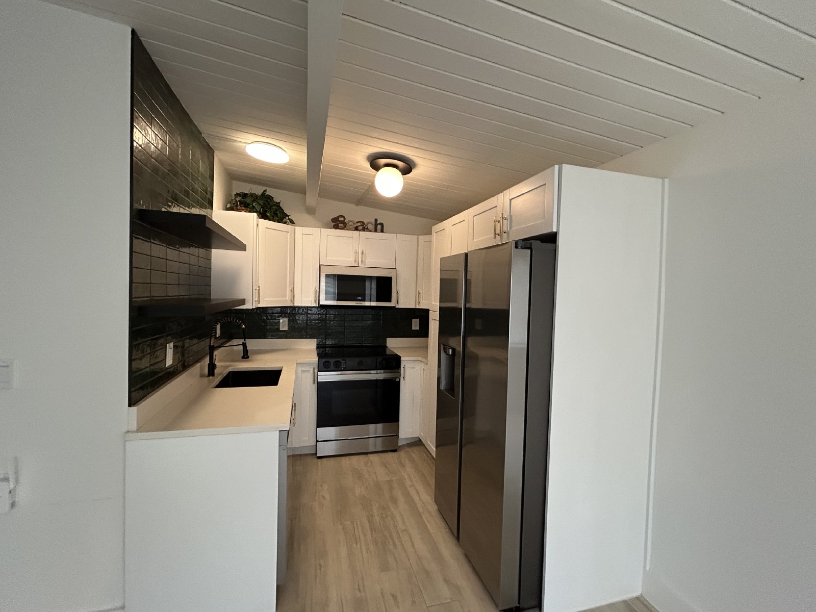 Waterfront attached suite with boat dock property image